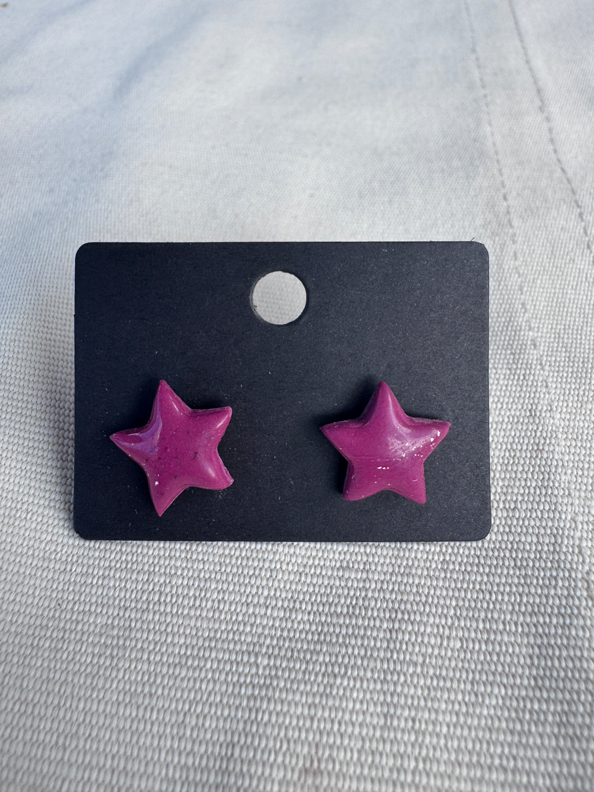 Estrella fucsia oscuro