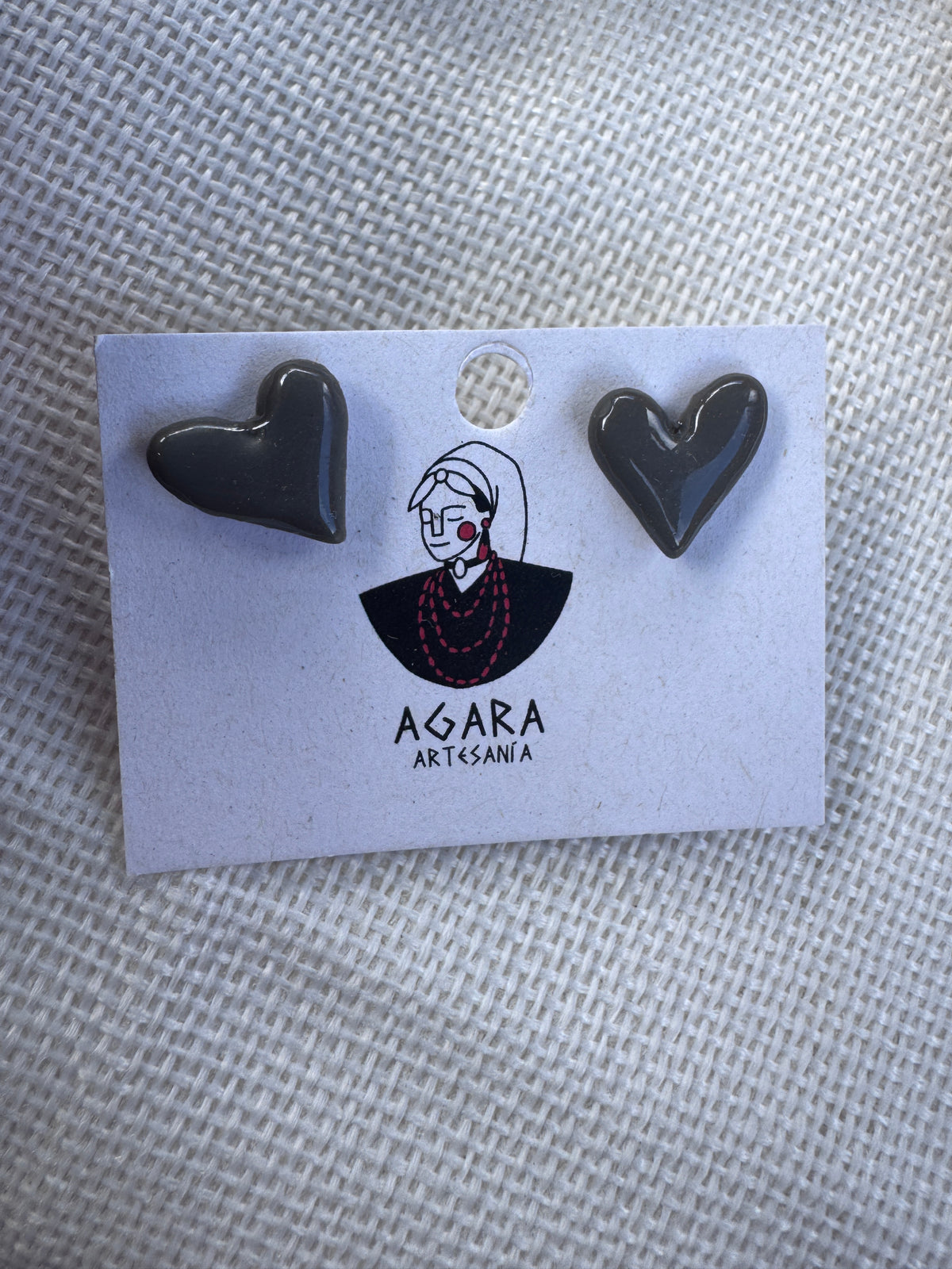 Corazón desdibujado gris